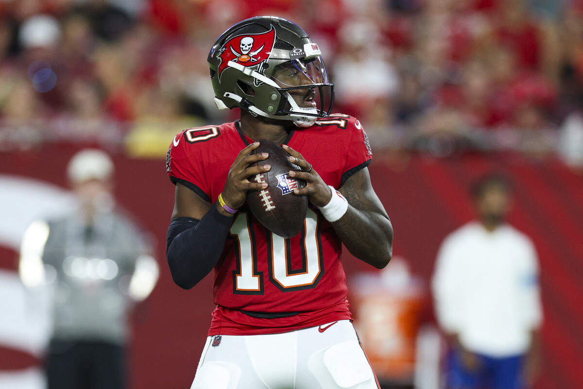 Tampa Bay Buccaneers quarterback Jalon Daniels (10), formerly of the Kansas Jayhawks, drops back to pass during a preseason NFL game against the Kansas City Chiefs on Saturday, Aug. 22, 2026 at Raymond James Stadium in Tampa.