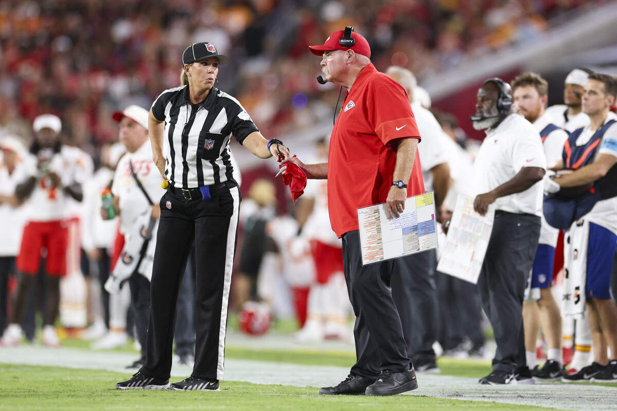 Kansas City Chiefs head coach Andy Reid throws a challenge flag during the second quarter of a preseason NFL game at Raymond James Stadium in Tampa on Saturday, Aug. 22, 2026.
