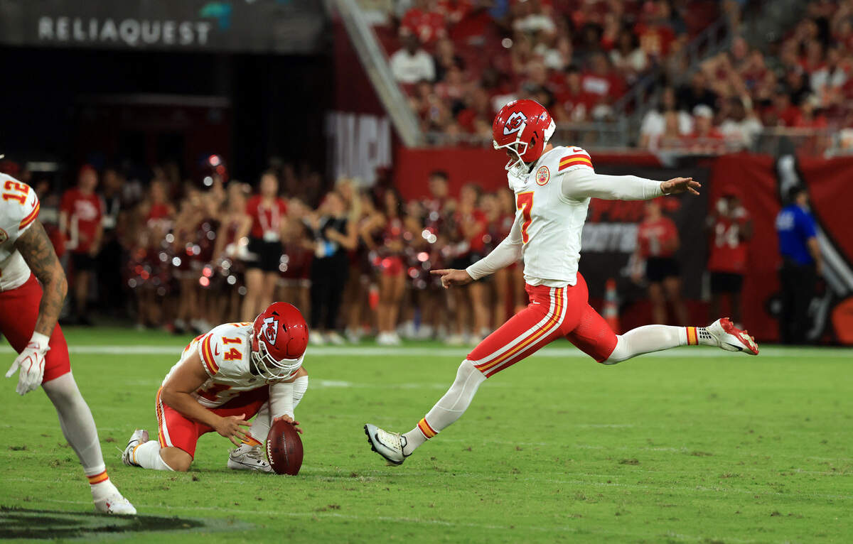 Kansas City Chiefs place kicker Harrison Butker (7) makes a 69-yard field goal against the Tampa Bay Buccaneers during a preseason NFL game at Raymond James Stadium in Tampa on Saturday, Aug. 22, 2026.