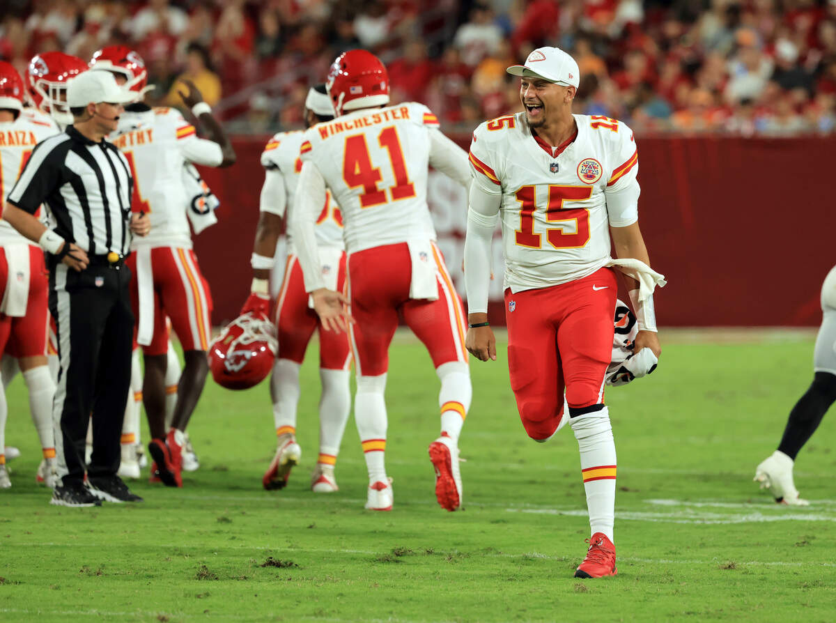 Kansas City Chiefs quarterback Patrick Mahomes (15) celebrates teammate Harrison Butker’s 69-yard field goal during a preseason NFL game against the Tampa Bay Buccaneers at Raymond James Stadium in Tampa on Saturday, Aug. 22, 2026.