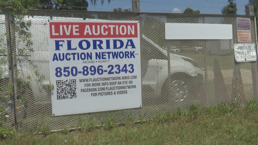 Vans, trucks, squad cars and equipment available at online government auction