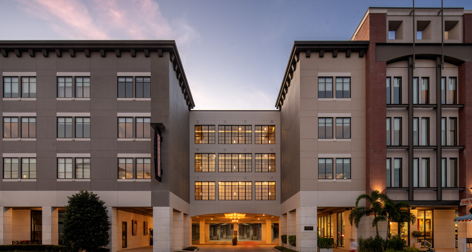 Exterior of the Epicurean Hotel along South Howard Avenue in Tampa at dusk.