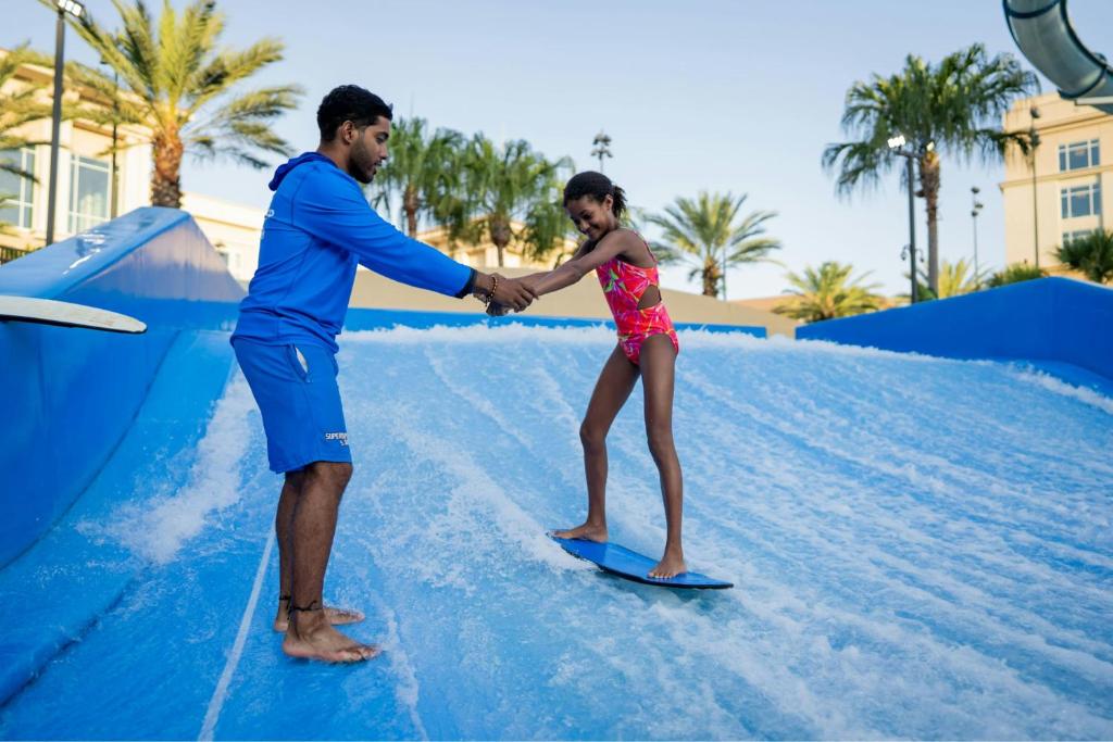 11 Hotels in Orlando with Water Parks—Lazy Pools, Splash Pads, Slides, & More