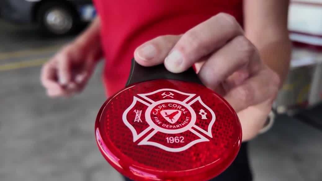 Florida firefighters provide backpack reflectors for bus stop