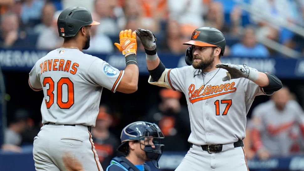 Baltimore Orioles' Colton Cowser (17) celebrates his two-run home run off Tampa Bay Rays pitcher Steven Matz with Leody Taveras (30) during the sixth inning of a baseball game Sunday, Aug. 16, 2026, in St. Petersburg, Fla. (AP Photo/Chris O'Meara)