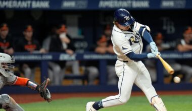 Tampa Bay Rays' Jonny DeLuca lines a two-run single off Baltimore Orioles pitcher Josh Walker during the seventh inning of a baseball game Monday, Aug. 17, 2026, in St. Petersburg, Fla. (AP Photo/Chris O'Meara)