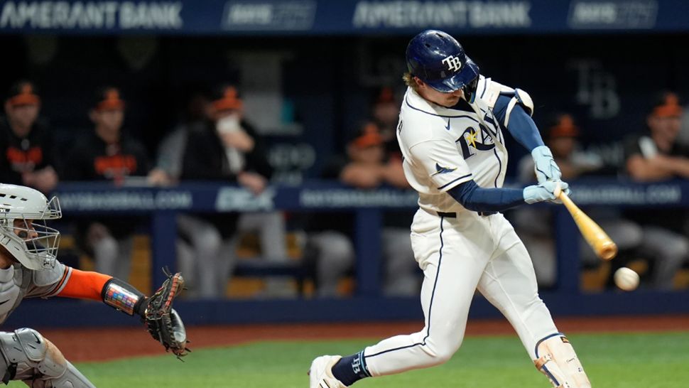 Tampa Bay Rays' Jonny DeLuca lines a two-run single off Baltimore Orioles pitcher Josh Walker during the seventh inning of a baseball game Monday, Aug. 17, 2026, in St. Petersburg, Fla. (AP Photo/Chris O'Meara)
