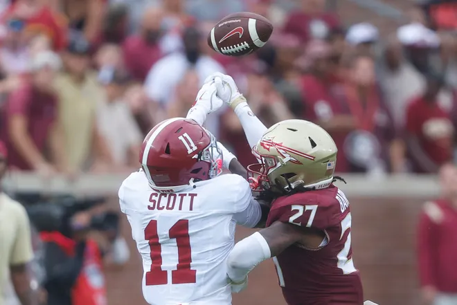 TALLAHASSEE, FLORIDA - AUGUST 30: Ashlynd Barker #27 of the Florida State Seminoles breaks up a pass intended for Rico Scott #11 of the Alabama Crimson Tide during the third quarter of a football game at Doak Campbell Stadium on August 30, 2025 in Tallahassee, Florida. (Photo by Butch Dill/Getty Images)
