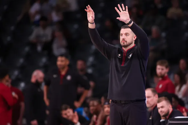 Feb 28, 2026; Atlanta, Georgia, USA; Florida State Seminoles head coach Luke Loucks calls a play against the Georgia Tech Yellow Jackets in the first half at McCamish Pavilion. Mandatory Credit: Brett Davis-Imagn Images