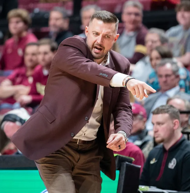 Florida State Seminoles head coach Luke Loucks calls a play from the bench. The Virginia Cavaliers defeated the Florida State Seminoles 61-58 at the Tucker Civic Center on Tuesday, Feb. 10, 2026.