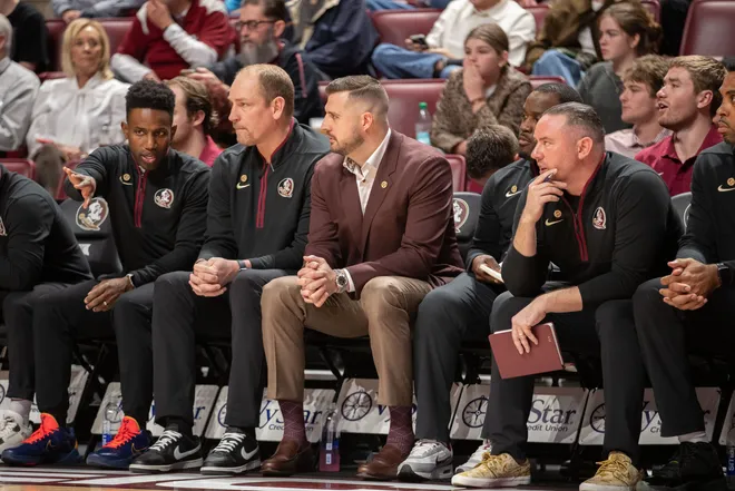 Florida State Seminoles head coach Luke Loucks sits with his coaching staff during the game. The Virginia Cavaliers defeated the Florida State Seminoles 61-58 at the Tucker Civic Center on Tuesday, Feb. 10, 2026.