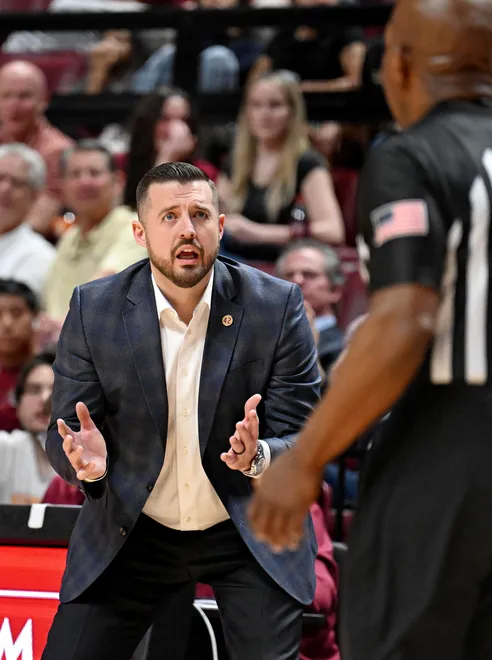 Feb 17, 2026; Tallahassee, Florida, USA; Florida State Seminoles head coach Luke Loucks disagrees with a referee during the first half against the Boston College Eagles at Donald L. Tucker Center. Mandatory Credit: Melina Myers-Imagn Images