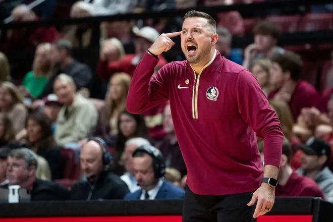 Florida State Seminoles head coach Luke Loucks signals to his players as he yells from the sidelines. The Duke Blue Devils defeated the Florida State Seminoles 91-87 at the Tucker Civic Center on Saturday, Jan. 3, 2026.