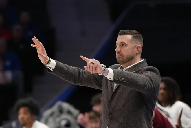 Mar 12, 2026; Charlotte, NC, USA; Florida State Seminoles head coach Luke Loucks in the first half at Spectrum Center. Mandatory Credit: Bob Donnan-Imagn Images