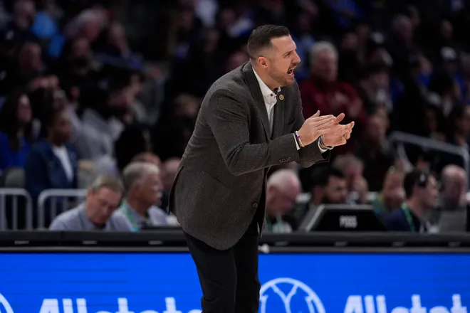 Mar 12, 2026; Charlotte, NC, USA; Florida State Seminoles head coach Luke Loucks encourages his team during the second half against the Duke Blue Devils at Spectrum Center. Mandatory Credit: Jim Dedmon-Imagn Images