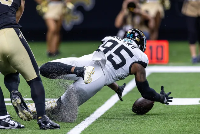Aug 15, 2026; New Orleans, Louisiana, USA; Jacksonville Jaguars defensive end B.J. Green II (95) recovers a fumble by New Orleans Saints quarterback Spencer Rattler (2) during the first half at Caesars Superdome. Mandatory Credit: Stephen Lew-Imagn Images