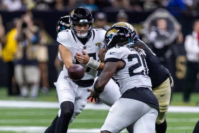 Aug 15, 2026; New Orleans, Louisiana, USA; Jacksonville Jaguars quarterback Joey Aguilar (17) hands off to running back Deejay Dallas (20) against New Orleans Saints during the second half at Caesars Superdome. Mandatory Credit: Stephen Lew-Imagn Images