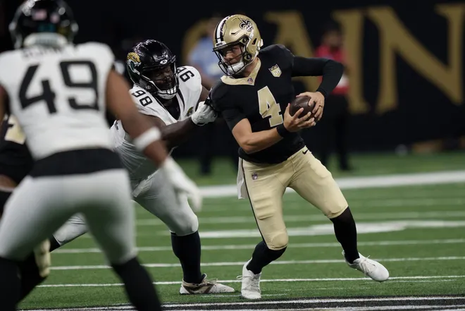 Aug 15, 2026; New Orleans, Louisiana, USA; Jacksonville Jaguars defensive lineman Albert Regis (98) sacks New Orleans Saints quarterback Zach Wilson (4) during the second half at Caesars Superdome. Mandatory Credit: Matthew Hinton-Imagn Images