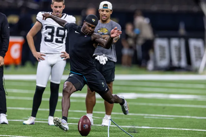 Aug 15, 2026; New Orleans, Louisiana, USA; Jacksonville Jaguars wide receiver Travis Hunter (12) misses a field goal with place kicker Cam Little (39) against the New Orleans Saints at Caesars Superdome. Mandatory Credit: Stephen Lew-Imagn Images