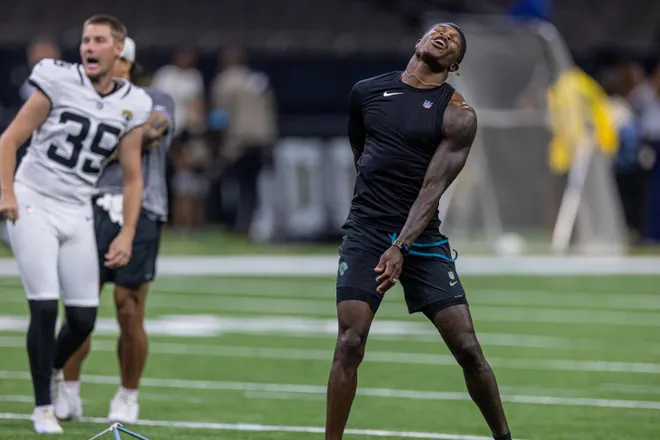 Aug 15, 2026; New Orleans, Louisiana, USA; Jacksonville Jaguars wide receiver Travis Hunter (12) reacts to missing a field goal with place kicker Cam Little (39) against the New Orleans Saints at Caesars Superdome. Mandatory Credit: Stephen Lew-Imagn Images