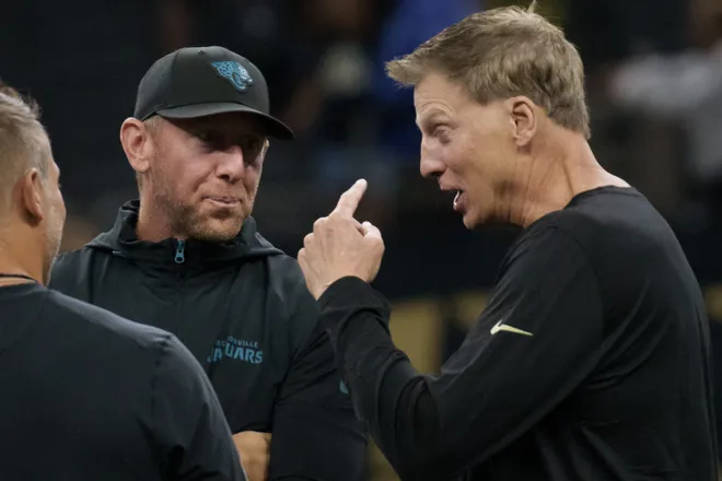 Aug 15, 2026; New Orleans, Louisiana, USA; Jacksonville Jaguars head coach Liam Coen talks to New Orleans Saints offensive coordinator Doug Nussmeir at Caesars Superdome. Mandatory Credit: Matthew Hinton-Imagn Images
