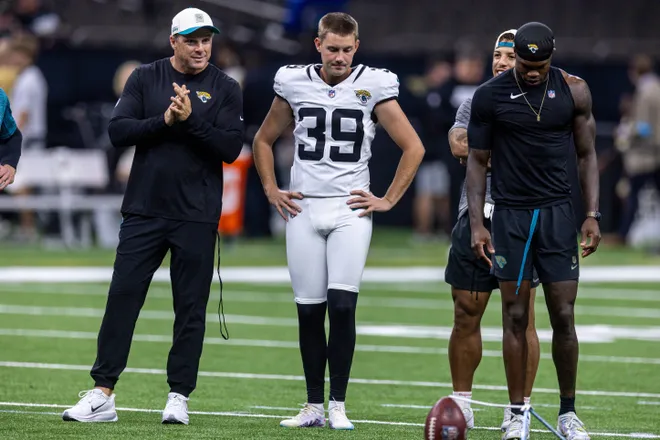 Aug 15, 2026; New Orleans, Louisiana, USA; Jacksonville Jaguars wide receiver Travis Hunter (12) lines up to kick a field goal with place kicker Cam Little (39) against the New Orleans Saints at Caesars Superdome. Mandatory Credit: Stephen Lew-Imagn Images