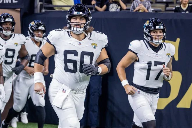 Aug 15, 2026; New Orleans, Louisiana, USA; Jacksonville Jaguars center Jonah Monheim (60) and quarterback Joey Aguilar (17) run out the tunnel against the New Orleans Saints at Caesars Superdome. Mandatory Credit: Stephen Lew-Imagn Images