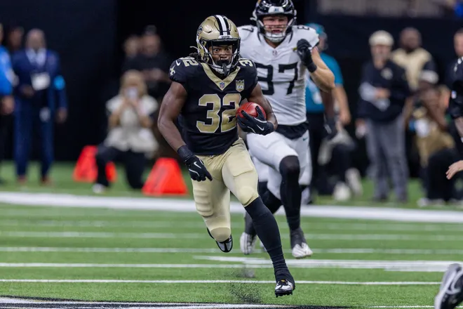 Aug 15, 2026; New Orleans, Louisiana, USA; New Orleans Saints running back Ty Chandler (32) runs the opening kickoff against the Jacksonville Jaguars during the first half at Caesars Superdome. Mandatory Credit: Stephen Lew-Imagn Images