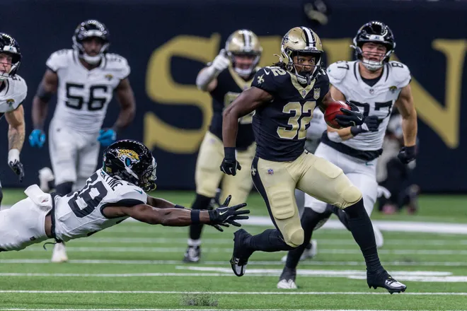 Aug 15, 2026; New Orleans, Louisiana, USA; New Orleans Saints running back Ty Chandler (32) runs the opening kickoff against the Jacksonville Jaguars during the first half at Caesars Superdome. Mandatory Credit: Stephen Lew-Imagn Images