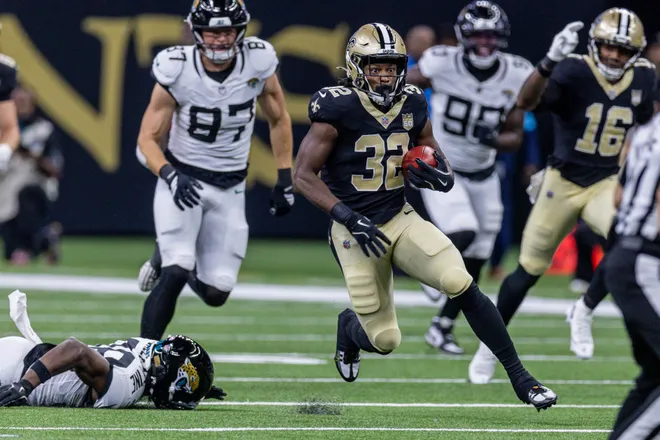Aug 15, 2026; New Orleans, Louisiana, USA; New Orleans Saints running back Ty Chandler (32) runs the opening kickoff against the Jacksonville Jaguars during the first half at Caesars Superdome. Mandatory Credit: Stephen Lew-Imagn Images