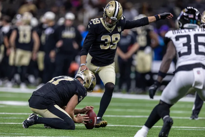 Aug 15, 2026; New Orleans, Louisiana, USA; New Orleans Saints place kicker Charlie Smyth (39) kicks an extra point against Jacksonville Jaguars during the first half at Caesars Superdome. Mandatory Credit: Stephen Lew-Imagn Images