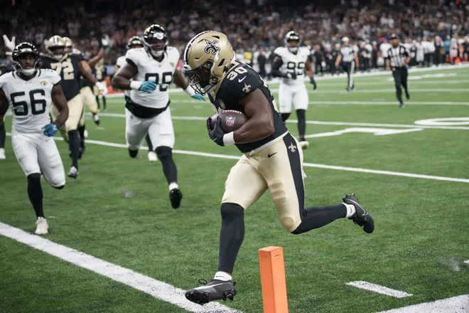 Aug 15, 2026; New Orleans, Louisiana, USA; New Orleans Saints running back Audric Estime (30) scores a touchdown against the Jacksonville Jaguars during the first quarter at Caesars Superdome. Mandatory Credit: Matthew Hinton-Imagn Images