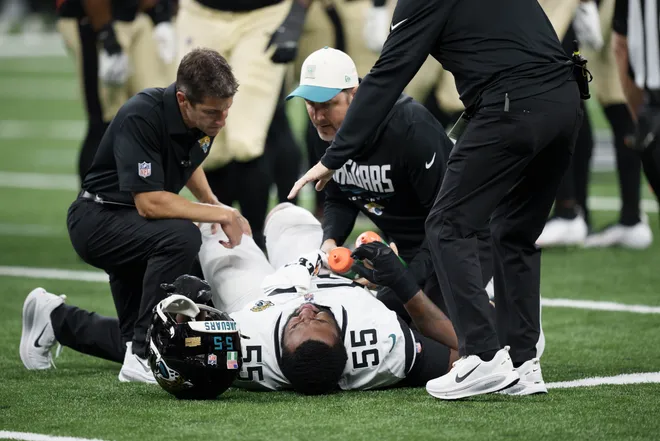 Aug 15, 2026; New Orleans, Louisiana, USA; Jacksonville Jaguars offensive lineman Chuma Edoga (55) lies on the turf after a play against the New Orleans Saints during the first quarter at Caesars Superdome. Mandatory Credit: Matthew Hinton-Imagn Images