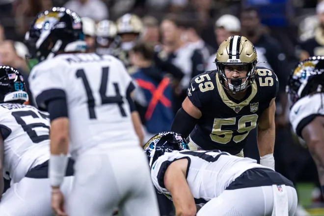 Aug 15, 2026; New Orleans, Louisiana, USA; New Orleans Saints defensive edge Garrett Nelson (59) sacks Jacksonville Jaguars quarterback Nick Mullens (14) during the first half at Caesars Superdome. Mandatory Credit: Stephen Lew-Imagn Images