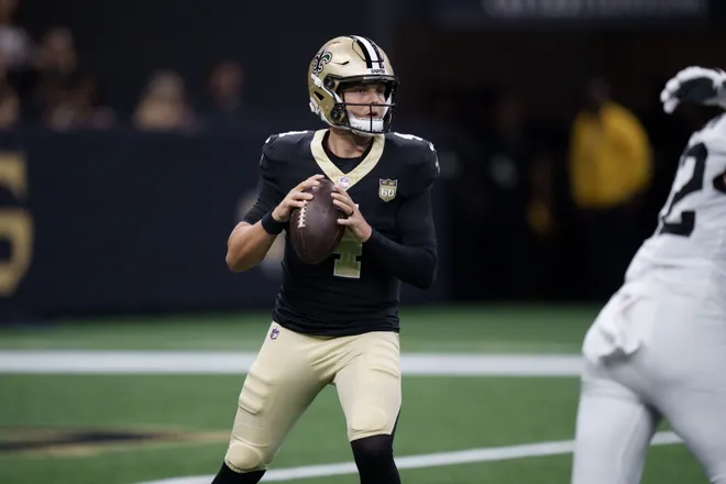 Aug 15, 2026; New Orleans, Louisiana, USA; New Orleans Saints quarterback Zach Wilson (4) looks to throw against the Jacksonville Jaguars during the second quarter at Caesars Superdome. Mandatory Credit: Matthew Hinton-Imagn Images
