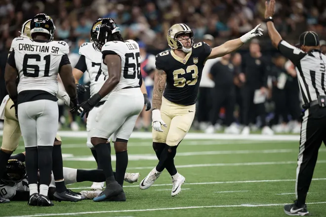 Aug 15, 2026; New Orleans, Louisiana, USA; New Orleans Saints defensive lineman Michael Heldman (63) sacks Jacksonville Jaguars quarterback Carter Bradley (10) during the second quarter at Caesars Superdome. Mandatory Credit: Matthew Hinton-Imagn Images