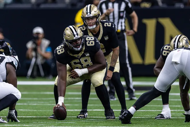 Aug 15, 2026; New Orleans, Louisiana, USA; New Orleans Saints guard Torricelli Simpkins III (68) hikes the ball to quarterback Spencer Rattler (2) against the Jacksonville Jaguars during the first half at Caesars Superdome. Mandatory Credit: Stephen Lew-Imagn Images