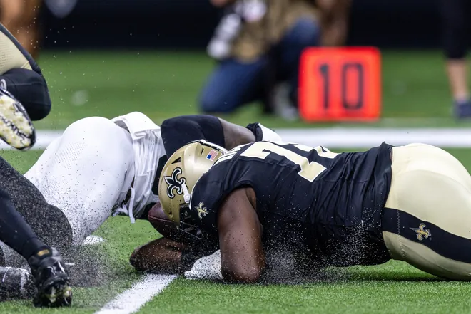 Aug 15, 2026; New Orleans, Louisiana, USA; Jacksonville Jaguars defensive end B.J. Green II (95) recovers a fumble by New Orleans Saints quarterback Spencer Rattler (2) during the first half at Caesars Superdome. Mandatory Credit: Stephen Lew-Imagn Images