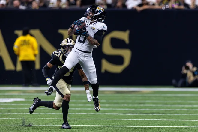 Aug 15, 2026; New Orleans, Louisiana, USA; Jacksonville Jaguars wide receiver Michael Wortham (0) catches a pass against Jacksonville Jaguars cornerback Jabbar Muhammad (37) during the second half at Caesars Superdome. Mandatory Credit: Stephen Lew-Imagn Images
