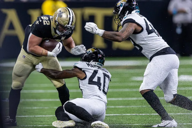 Aug 15, 2026; New Orleans, Louisiana, USA; New Orleans Saints tight end Treyton Welch (82) is tackled by Jacksonville Jaguars cornerback Devon Marshall (40) during the second half at Caesars Superdome. Mandatory Credit: Stephen Lew-Imagn Images
