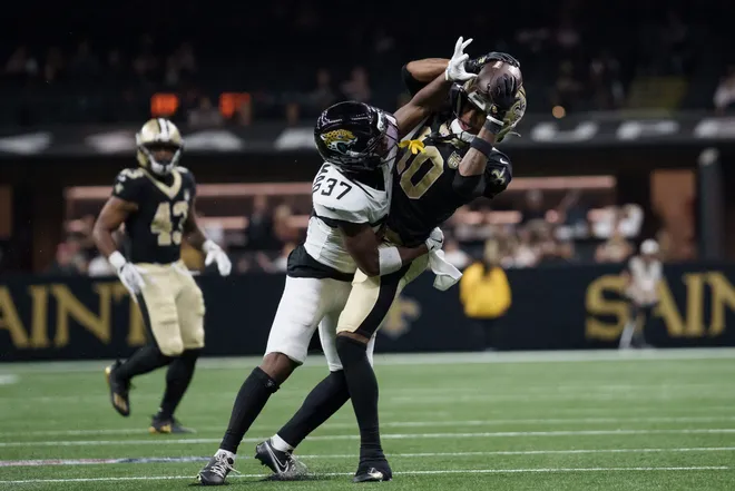 Aug 15, 2026; New Orleans, Louisiana, USA; New Orleans Saints wide receiver Trey Palmer (10) makes a catch against Jacksonville Jaguars defensive back Jabbar Muhammad (37) during the fourth quarter at Caesars Superdome. Mandatory Credit: Matthew Hinton-Imagn Images