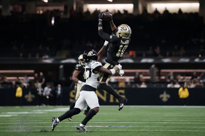 Aug 15, 2026; New Orleans, Louisiana, USA; New Orleans Saints wide receiver Trey Palmer (10) makes a catch against Jacksonville Jaguars defensive back Jabbar Muhammad (37) during the fourth quarter at Caesars Superdome. Mandatory Credit: Matthew Hinton-Imagn Images