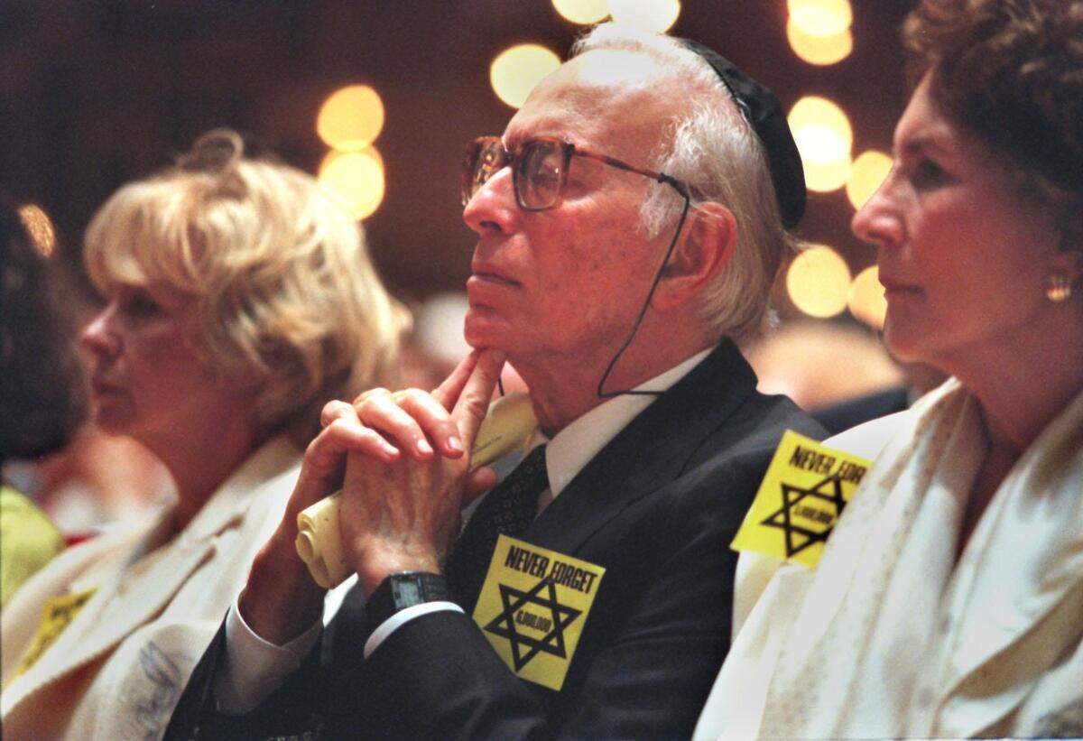 Kenneth Treister at the Yom Hashoah Commemoration at Temple Emanu-El on Miami Beach in 1997.