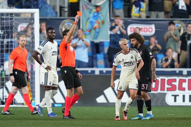 Referee Filip Dujic shows Union midfielder Cavan Sullivan a red card in second-half stoppage time of Wednesday's 2-2 draw with Inter Miami. (AP Photo/Matt Rourke)