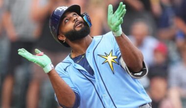 Tampa Bay's Junior Caminero celebrates as he crosses home plate after hitting a 2-run homer against the Colorado Rockies in the first inning Monday afternoon in Denver. (AP Photo/David Zalubowski)