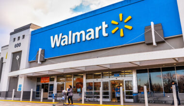Walmart store entrance with the retailer’s blue facade and Walmart logo above the doors