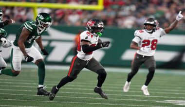 Tampa Bay Buccaneers cornerback Ayden Garnes (24) runs from New York Jets wide receiver Tim Patrick (17) while returning an interception for a touchdown during the first half of a preseason NFL football game, Friday, Aug. 14, 2026, in East Rutherford, N.J. (AP Photo/Frank Franklin II)