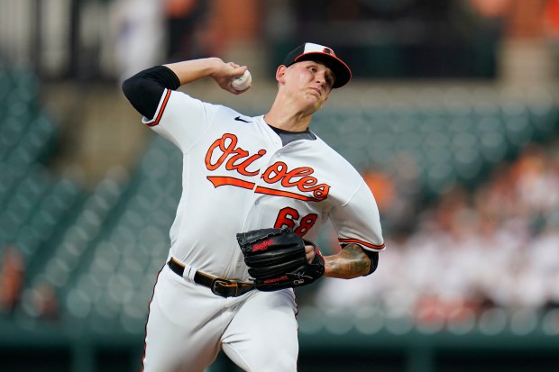 Baltimore Orioles starting pitcher Tyler Wells throws a pitch to the Toronto Blue Jays during the first inning of a baseball game, Wednesday, Sept. 7, 2022, in Baltimore. (AP Photo/Julio Cortez)