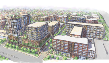 Artist rendering of a proposed mixed-use development in East Ybor City showing residential and commercial buildings across multiple city blocks.
