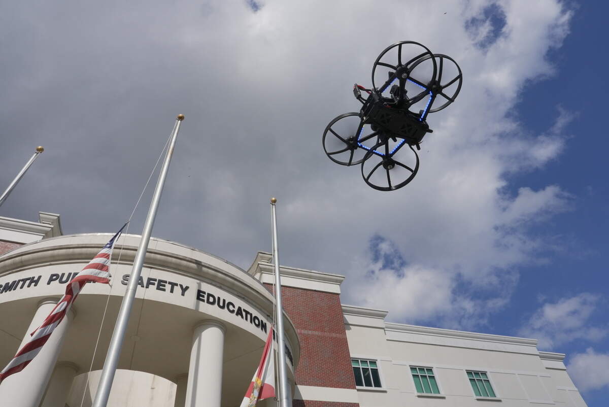 A Campus Guardian Angel drone flies through a high school as part of a demonstration. The drones are designed to respond to school shooters with pepper spray, flashing lights and loud noise. Some school districts in Florida, including Broward, are participating in a pilot program that will install the drones into schools.